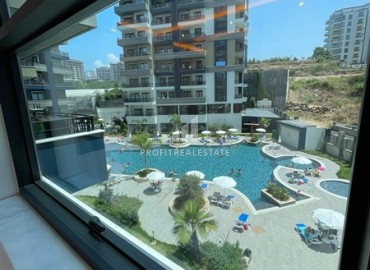 One bedroom apartment, 55m², in an elite new building in Mahmutlar, 650m from the sea, Alanya ID-15543 фото-6