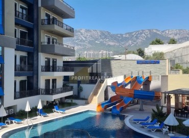 One bedroom apartment, 55m², in an elite new building in Mahmutlar, 650m from the sea, Alanya ID-15543 фото-16