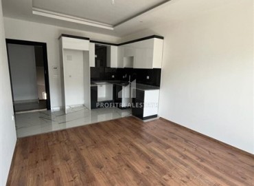 Unfurnished one bedroom apartment 55 m², with kitchen unit, in a new residential residence with facilities, Oba, Alanya ID-15546 фото-3