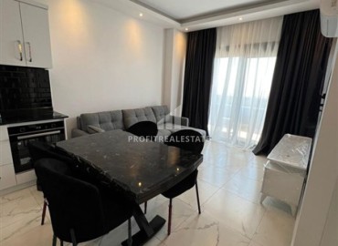 Stylish furnished one-bedroom apartment, 45m², in a new residential residence with facilities, Avsallar, Alanya ID-15547 фото-3