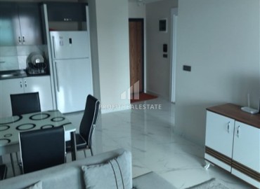 One bedroom furnished apartment, 55m², with sea views in a comfortable residence in the center of Mahmutlar ID-15555 фото-3