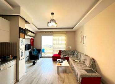 Меблированная квартира с одной спальней, 55м², в резиденции с бассейном, в 300м от моря в районе Мерсина Мезитли ID-15610 фото-2