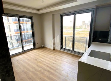 Stylish one bedroom apartment, 55m², in a luxury residence under construction in Erdemli, Arpacbakhsis ID-15611 фото-5