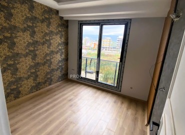 Стильные двухкомнатные апартаменты, 55м², в элитном комплексе на этапе строительства в Эрдемли, Арпачбахшиш ID-15611 фото-10