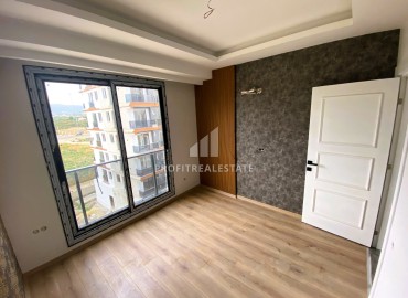 Stylish one bedroom apartment, 55m², in a luxury residence under construction in Erdemli, Arpacbakhsis ID-15611 фото-11