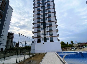 Стильные двухкомнатные апартаменты, 55м², в элитном комплексе на этапе строительства в Эрдемли, Арпачбахшиш ID-15611 фото-18