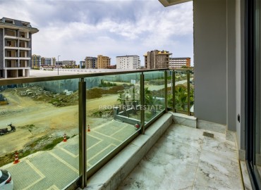 Трехкомнатная квартира, 100м², с интерьером от дизайнера в комфортабельной резиденции у моря в Каргыджаке, Алания ID-15617 фото-12