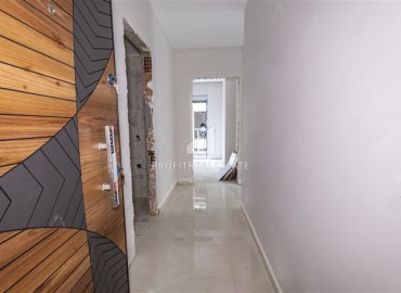 Квартира с одной спальней, 55м², в комплексе с отличной локацией на этапе строительства в районе Алании - Махмутлар ID-15624 фото-5