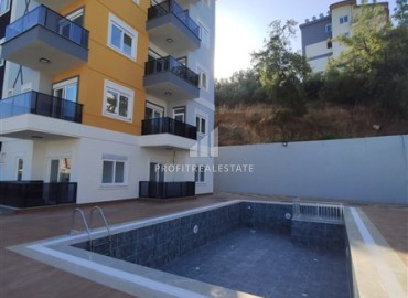 Новые двухкомнатные апартаменты, 55м² с чистовой отделкой в новостройке с бассейном в районе Алании Конаклы ID-15628 фото-13