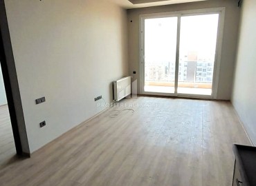 Комфортабельная квартира с одной спальней, 71м², в новом комплексе в районе Томюк, Мерсин ID-15637 фото-3