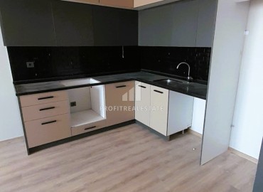 Комфортабельная квартира с одной спальней, 71м², в новом комплексе в районе Томюк, Мерсин ID-15637 фото-4