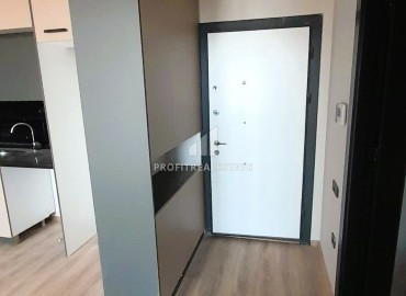 Комфортабельная квартира с одной спальней, 71м², в новом комплексе в районе Томюк, Мерсин ID-15637 фото-5