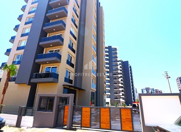 Комфортабельная квартира с одной спальней, 71м², в новом комплексе в районе Томюк, Мерсин ID-15637 фото-20