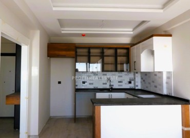 Новые апартаменты 2+1, 110м², с чистовой отделкой в районе Томюк, Эрдемли, в 500м от Средиземного моря ID-15638 фото-4