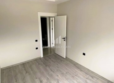 Новые апартаменты 2+1, 110м², с чистовой отделкой в районе Томюк, Эрдемли, в 500м от Средиземного моря ID-15638 фото-8