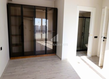 Новые апартаменты 2+1, 110м², с чистовой отделкой в районе Томюк, Эрдемли, в 500м от Средиземного моря ID-15638 фото-10