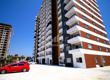 Новые апартаменты 2+1, 110м², с чистовой отделкой в районе Томюк, Эрдемли, в 500м от Средиземного моря ID-15638 фото-16