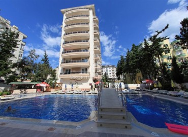 Furnished one-bedroom apartment, 40m² with views of the Alanya Fortress in the center of Alanya, in a cozy residence ID-15639 фото-1