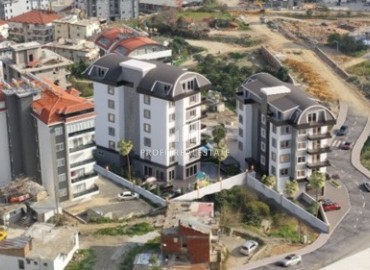 Inexpensive one bedroom apartment 50 m², unfurnished, fully finished, in a new building with facilities, Ciplakli, Alanya ID-15643 фото-1