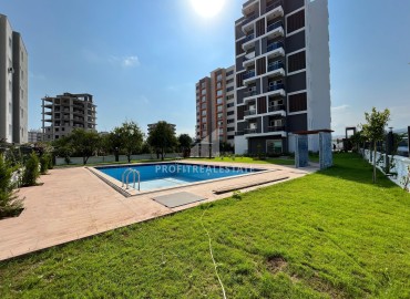 Furnished apartment 1+1, 50m², with mountain views in a new residence in Mezitli area, Mersin ID-15644 фото-1