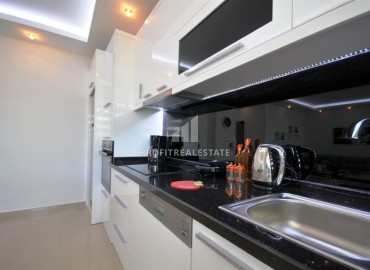 Furnished two bedroom apartment 120m², with a modern interior, in a residence with facilities, Oba, Alanya ID-15659 фото-3