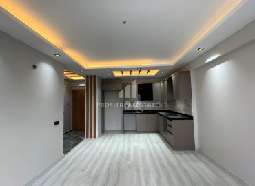 Stylish 1+1 apartment, 75m², in a residence with extensive facilities under construction in Erdemli, Arpacbakhsis ID-15667 фото-2