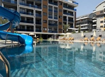 New apartment 2+1, 71m², fully finished in a residence with good facilities, 150m from the sea in Kargicak, Alanya ID-15354 фото-1