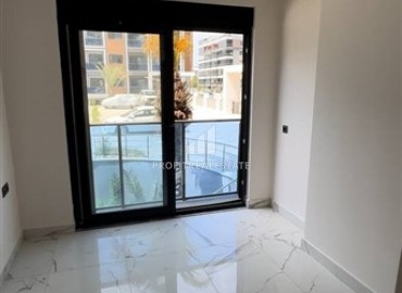 Новая квартира 2+1, 71м², с чистовой отделкой в комплексе с хорошей инфраструктурой, в 150м от моря в Каргыджаке, Алания ID-15354 фото-5
