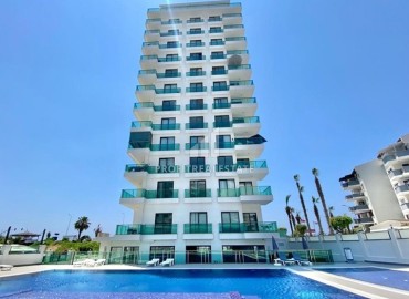 Elegant view apartment 2+1, on the first coastline, in a residence with extensive facilities, Mahmutlar, Alanya ID-15672 фото-1