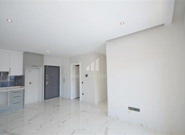 Новая квартира 2+1, 80м², с чистовой отделкой в новостройке премиум класса, в 150м от моря в Каргыджаке, Алания ID-15682 фото-4