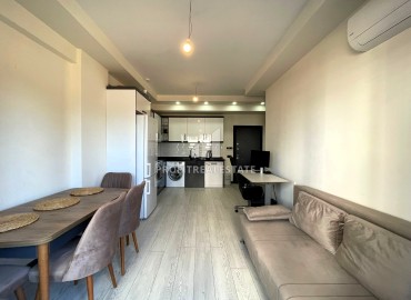 Новые апартаменты 1+1, 50м², со стильным интерьером в газифицированном комплексе в Тедже, Мерсин ID-15708 фото-2