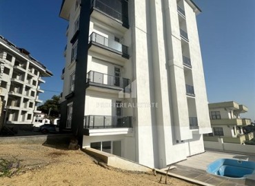 One-bedroom apartment 57m², unfurnished, in a new residential residence with facilities, in Avsallar, Alanya ID-15717 фото-12