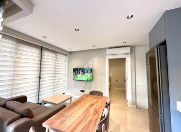 Furnished one bedroom apartment, 50m², in a premium new building in the center of Alanya, near Cleopatra Beach ID-15731 фото-4