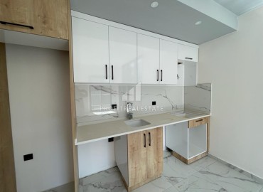 Недорогая двухкомнатная квартира 60м², с кухонным гарнитуром и встроенными шкафами, без мебели, Авсалларе, Аланья ID-15732 фото-4