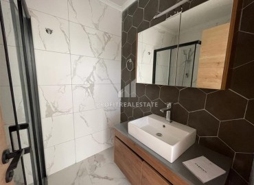 Inexpensive one bedroom apartment 60 m², with a kitchen unit and built-in wardrobes, unfurnished, Avsallar, Alanya ID-15732 фото-9