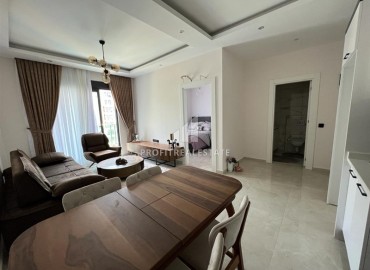 Furnished one-bedroom apartment 50m², with mountain views, in a residence with facilities, Mahmutlar, Alanya ID-15738 фото-2