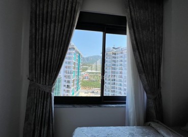 Furnished one-bedroom apartment 50m², with mountain views, in a residence with facilities, Mahmutlar, Alanya ID-15738 фото-6