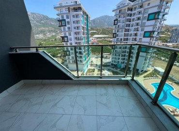 Furnished one-bedroom apartment 50m², with mountain views, in a residence with facilities, Mahmutlar, Alanya ID-15738 фото-9