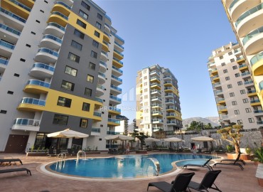 New one-bedroom apartment 55m², with sea and mountain views, in a residential residence with facilities, Mahmutlar, Alanya ID-15741 фото-2