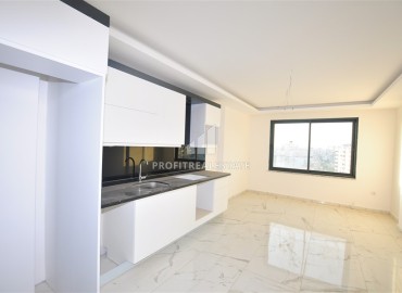 Новая двухкомнатная квартира 55м², с видом на море и горы, в жилой резиденции с инфраструктурой, Махмутлар, Аланья ID-15741 фото-5