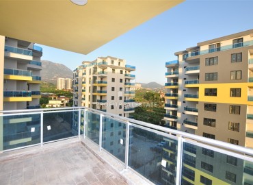 Новая двухкомнатная квартира 55м², с видом на море и горы, в жилой резиденции с инфраструктурой, Махмутлар, Аланья ID-15741 фото-8