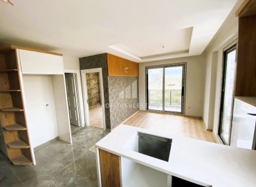 Nice one-bedroom apartment, 55m², in a premium new building in Erdemli, Arpacbakhsis ID-15742 фото-3