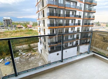 Симпатичная двухкомнатная квартира, 55м², в новостройке премиум класса в Эрдемли, Арпачбахшиш ID-15742 фото-14