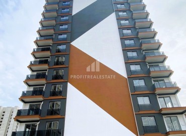 Симпатичная двухкомнатная квартира, 55м², в новостройке премиум класса в Эрдемли, Арпачбахшиш ID-15742 фото-16