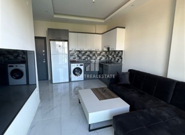 Furnished compact apartment 1+1, 40m², in an inexpensive residence with a swimming pool, in the Oba area, Alanya ID-15746 фото-2