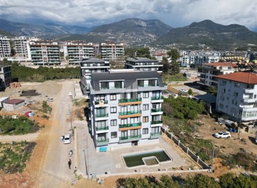Furnished compact apartment 1+1, 40m², in an inexpensive residence with a swimming pool, in the Oba area, Alanya ID-15746 фото-12