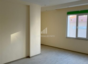 Двухкомнатная квартира без мебели 50м², в новостройке с инфраструктурой, в 300 метрах от моря, в центре Махмутлара, Аланья ID-15761 фото-4