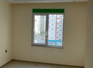 Двухкомнатная квартира без мебели 50м², в новостройке с инфраструктурой, в 300 метрах от моря, в центре Махмутлара, Аланья ID-15761 фото-10