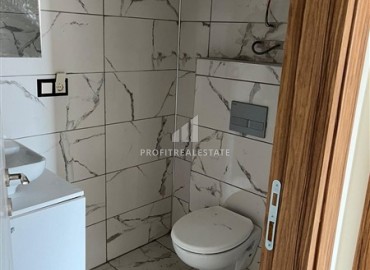 Unfurnished one bedroom apartment 50 m², in a new building with facilities, 300 meters from the sea, in the center of Mahmutlar, Alanya ID-15761 фото-11