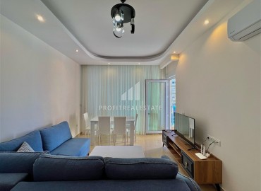 Стильная уютная двухкомнатная квартира с мебелью, 55м², в 450 метрах от моря, в комплексе с инфраструктурой, Махмутлар, Аланья ID-15774 фото-2
